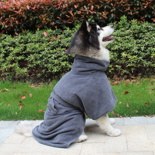 Husky wearing a Dark Grey dog bathrobe towel outdoors